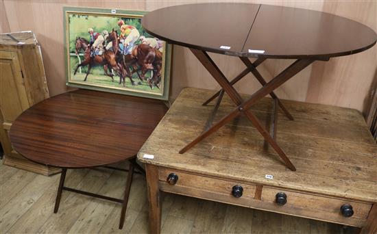 A pair of folding campaign tables, W.105cm